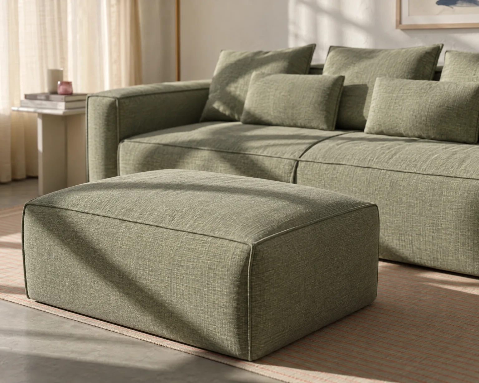 DANDY Puf foran en DANDY sofa